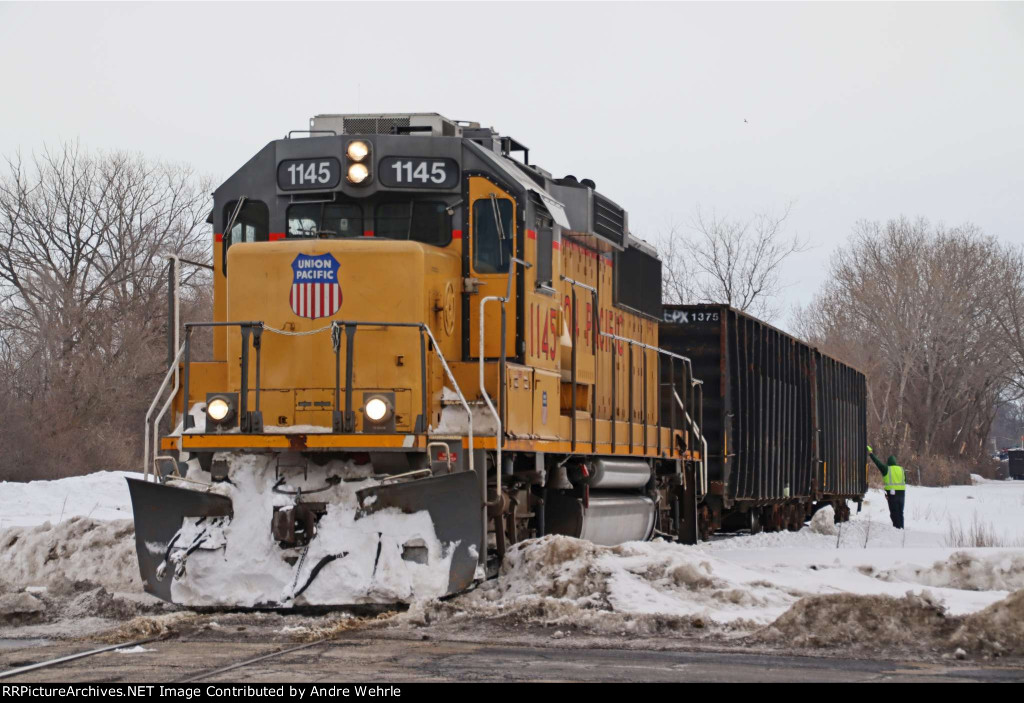 Coupling up to a pair of empties left just east of Blackhawk